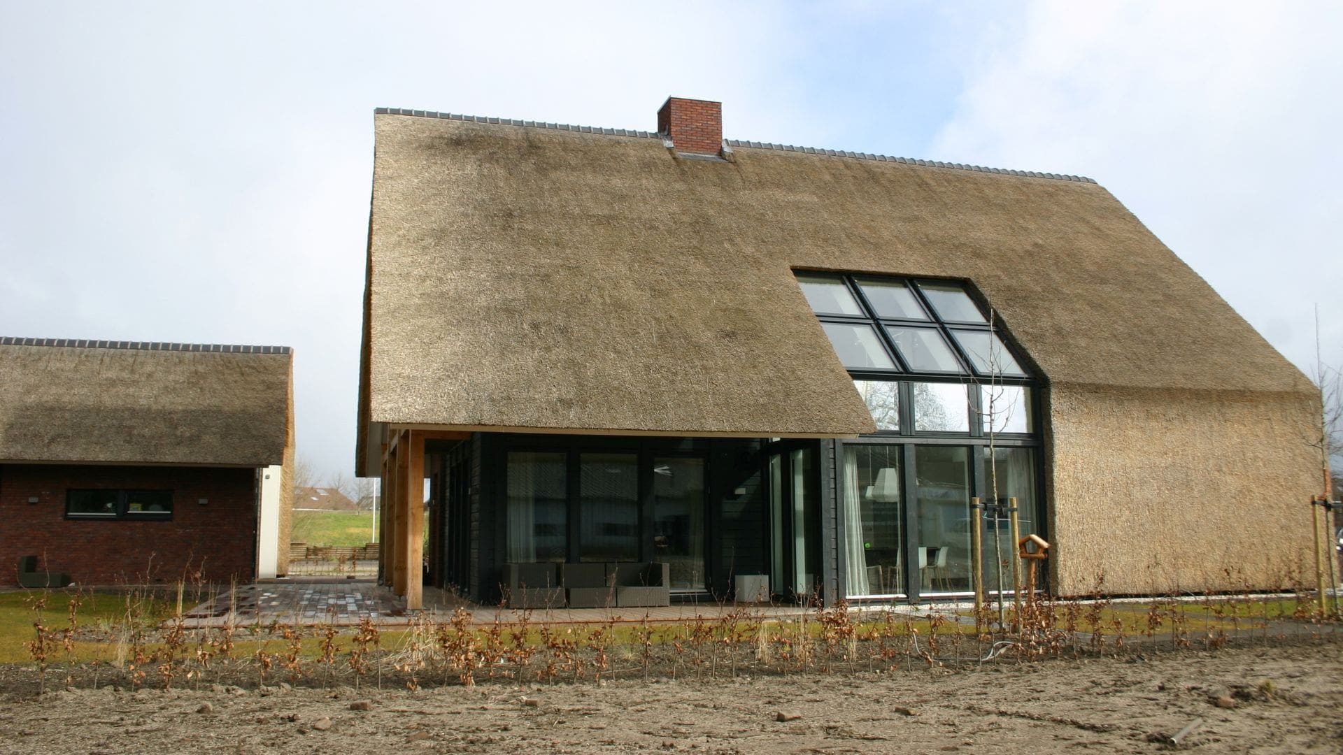 levande harderwijk woning met rieten dak